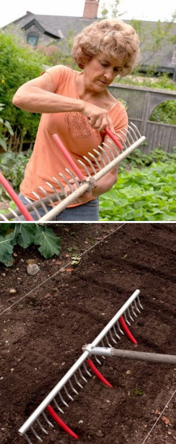 11-Use-A-Rake-With-Tubing-Attached-To-Mark-Rows-For-Planting